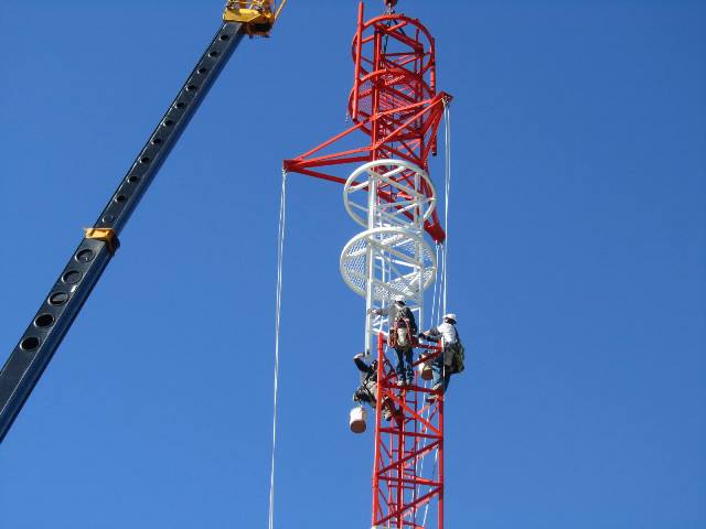 Communication tower installation in Death Valley and San Juan Batista