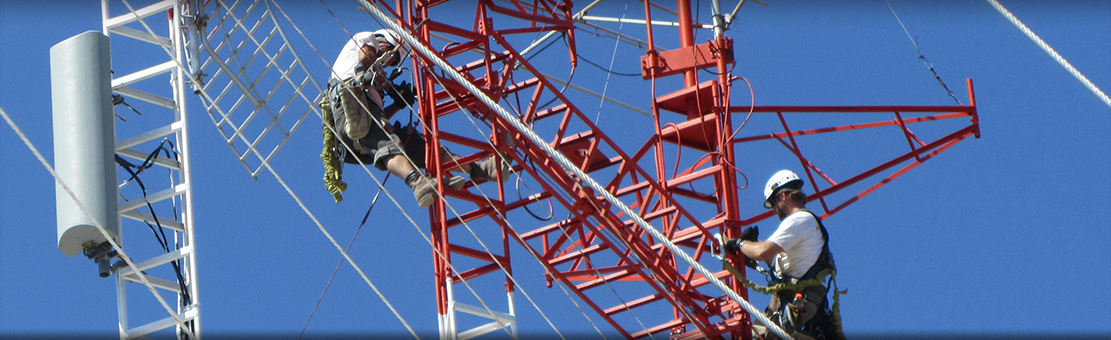 Person inspecting tower